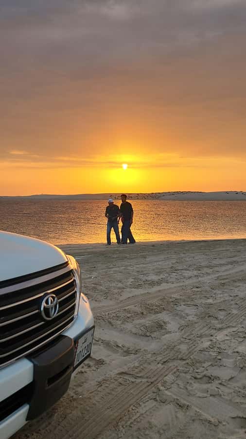 Doha: Desert Safari, Adventure, Sandboarding and Camel Ride - Camel riding at Sealine Beach