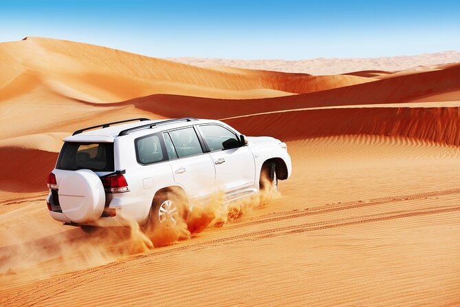 Doha Desert Safari Dune Bashing Camel Ride Sandboarding - Dune bashing across Qatar’s sand