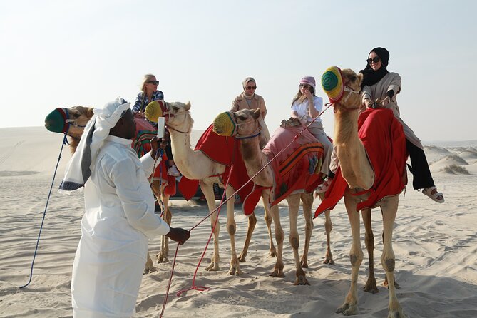 Doha Desert Safari Dune Bashing Camel Ride Sandboarding - Sandboarding and photo stops