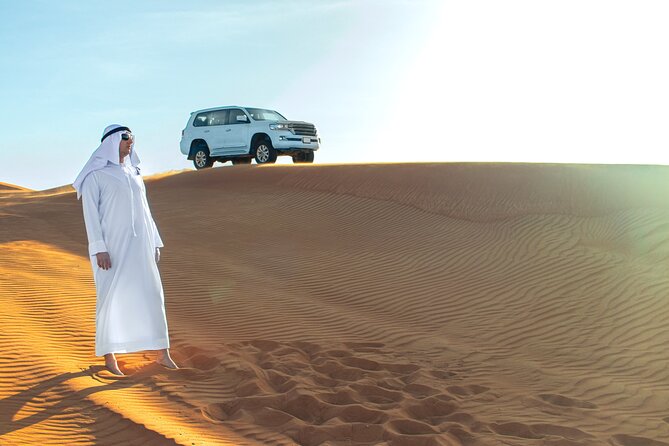 Doha Desert Safari Dune Bashing Camel Ride Sandboarding - Pickup from Doha and the road south