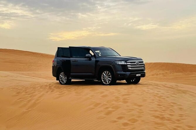 Doha: Desert Safari: Dune Bashing, Quad Bikes & Camel Rides - Sandboarding at the tourist point