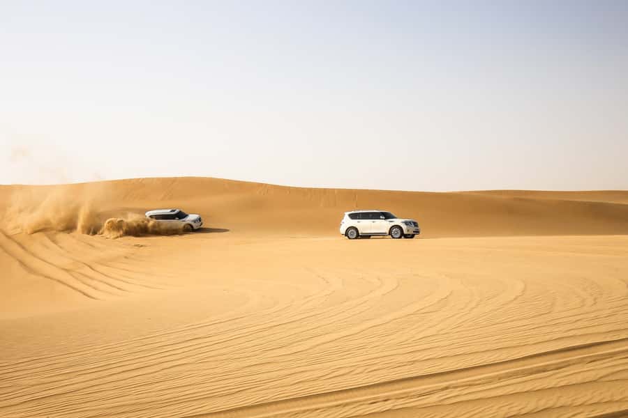 Doha: Desert Safari Dune Bashing, Sandboarding, & Camel Ride - The Inland Sea, where sand meets the Gulf