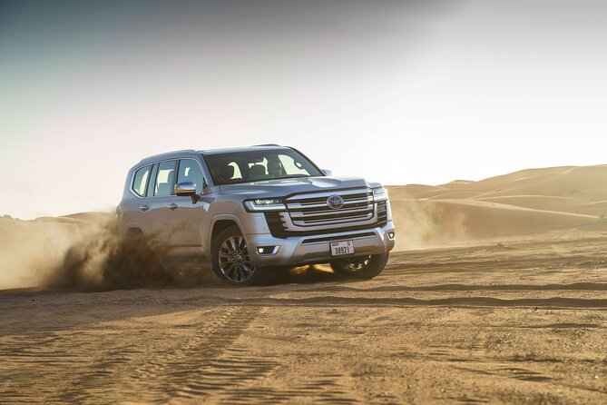 Doha Desert Safari Quad Bike Buggy Camel Ride and Inland Sea Tour - The Camel Stop at Sealine