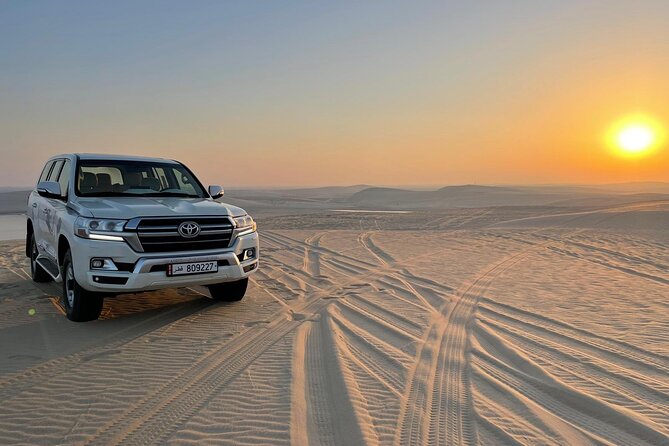 Doha: Desert Safari, Sand Boarding, Camel Ride & Inland Sea Tour - The guide can make or break the day