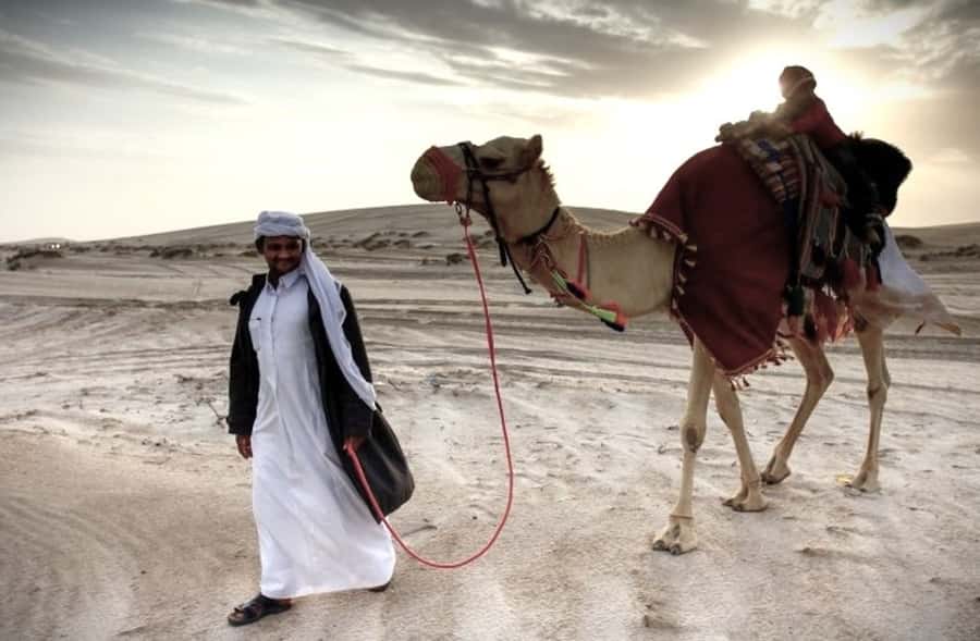 Doha Desert Safari: Sandboarding, Camel Ride & Swimming Fun - Leaving Doha for Mesaieed