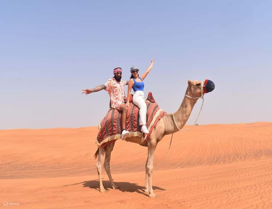 Doha: DesertSafari with Quad Bike, Camel Ride & Sandboarding - Khor Al Adaid, where desert meets sea