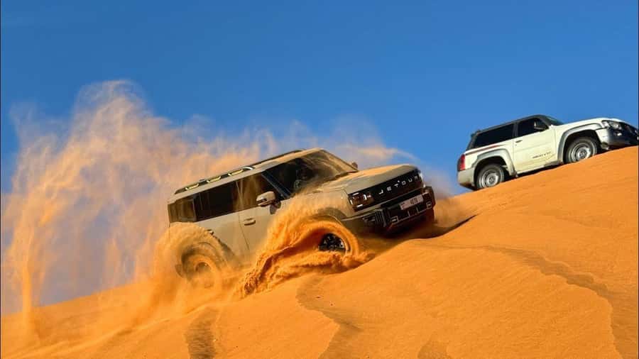 Doha: DesertSafari with Quad Bike, Camel Ride & Sandboarding - Guides, driving, and the human side of the trip