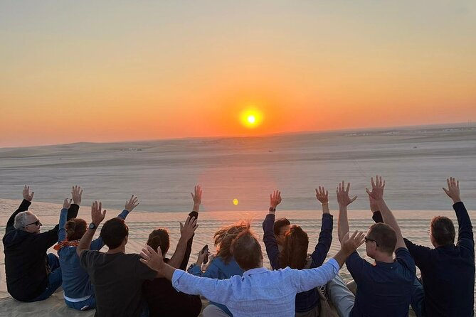 Doha Half Day Desert Safari Dune Bashing Camel Ride Sandboarding - Sunset among the dunes