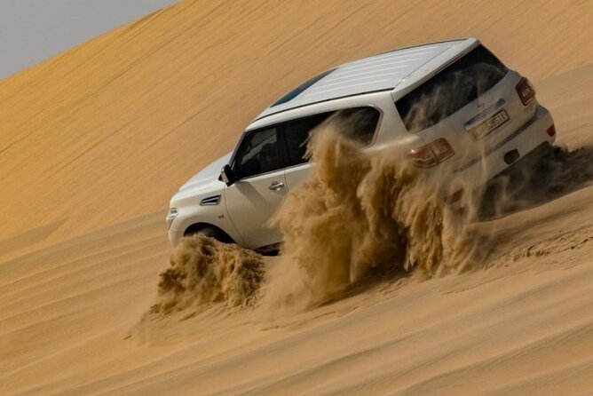 Doha Half Day Desert Safari Dune Bashing Camel Ride Sandboarding - Camel tents, tea, and a 10-minute ride