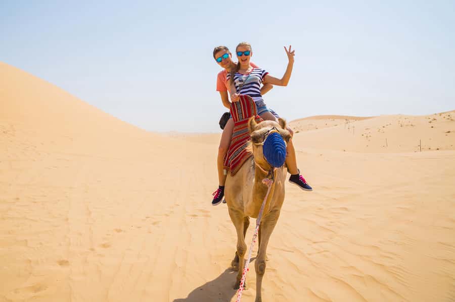 Doha: Half-Day Desert Safari, Quad Bike, Camels & Inland Sea - Camel photos before the big ride