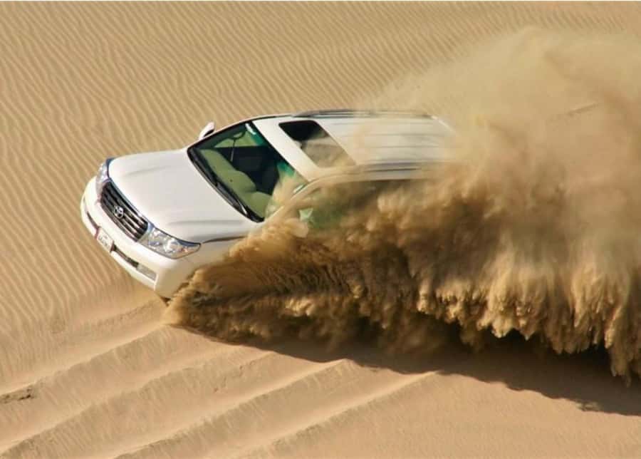 Doha : Inland Sea Desert Safari ,Camel Ride & Sandboarding - The main event: 4x4 dune bashing