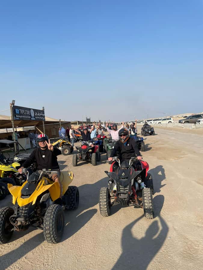Doha: Quad Bike, Desert Safari, Buggy ride & inland sea tour - Sandboarding on the dunes