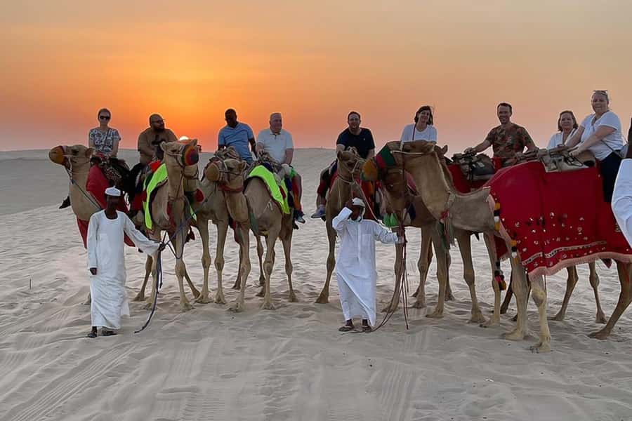 Doha Safari: ATV Ride, Dune Bashing, & Sandboarding Fun - Leaving Doha for the open desert