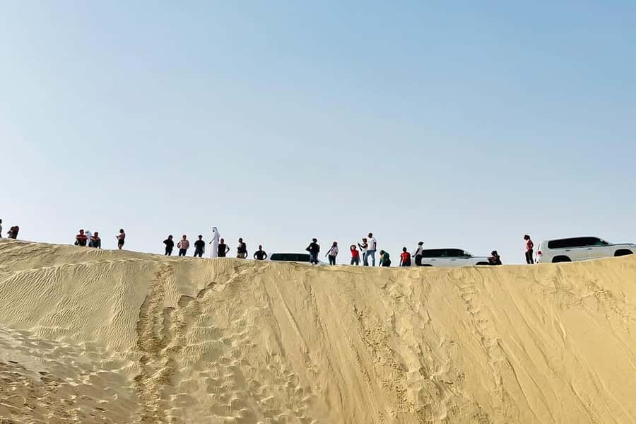 Doha Safari: ATV Ride, Dune Bashing, & Sandboarding Fun - Sandboarding for a quick final challenge