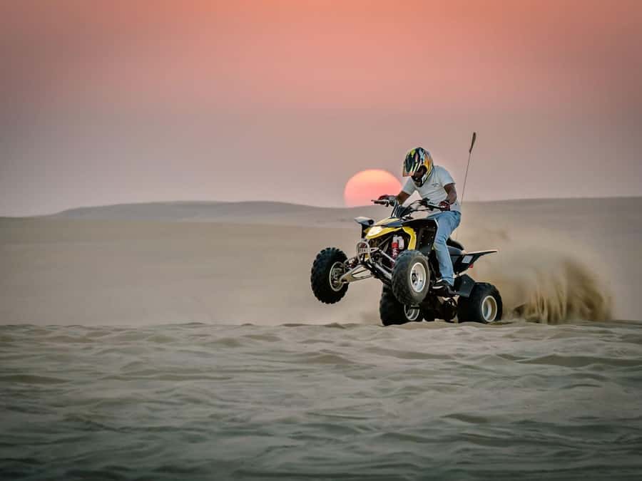 Doha: Safari, Camel Ride, Sandboarding and Inland Sea Tour - Sunset, tea, and the human touch