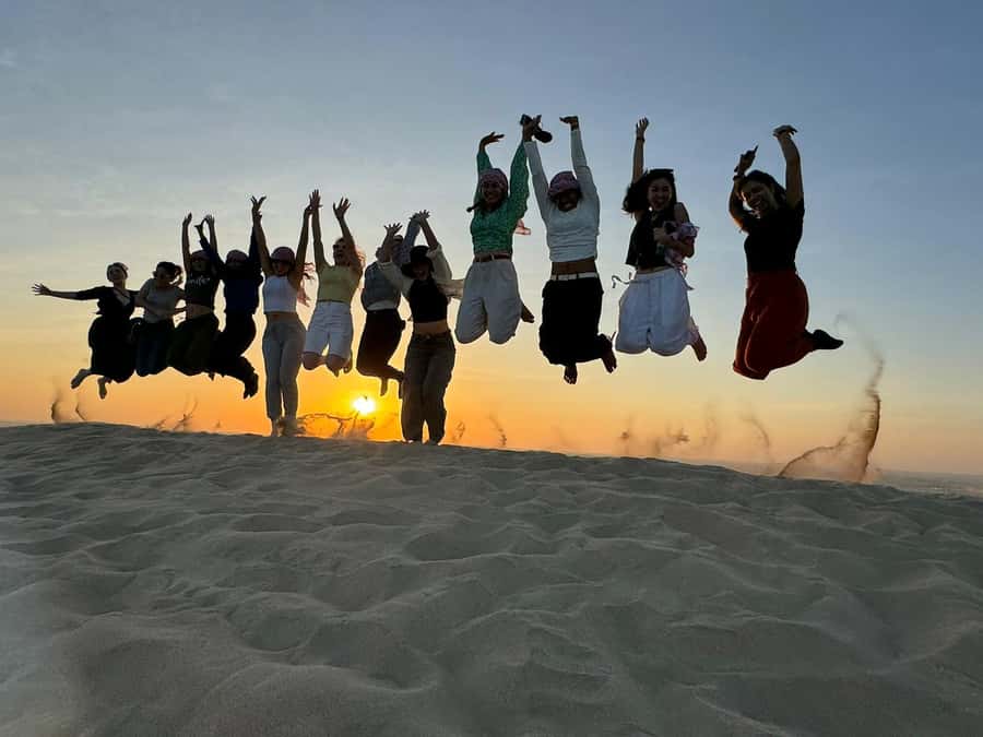 Doha: Sunset Safari, Dune Bashing, Sandboarding & Camel Ride - Pickup from Doha and the drive toward Mesaieed