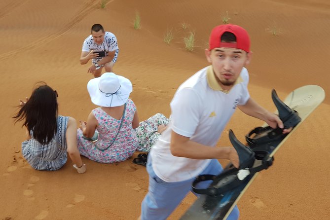 Dubai 4x4 Desert Safari, Quad Bike, Camel Ride & BBQ Dinner - Camel riding and a first taste of camp customs