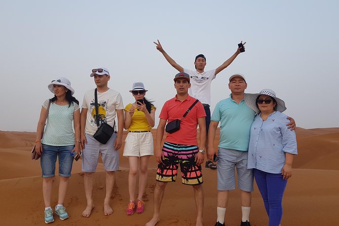 Dubai 4x4 Desert Safari, Quad Bike, Camel Ride & BBQ Dinner - Al Royal Desert Camp after dark