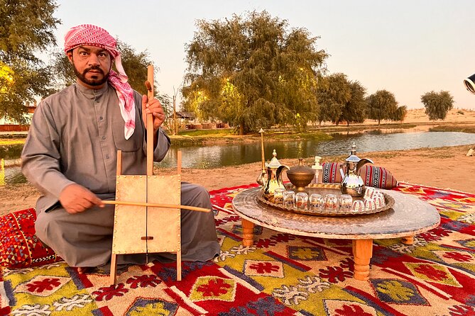 Dubai: Al Marmoom Oasis Vintage Safari: Camels, Stargazing & Meal - Sunset, falcons, and traditional activities