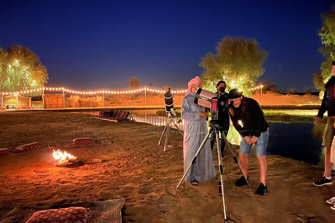 Dubai: Al Marmoom Oasis Vintage Safari: Camels, Stargazing & Meal - Entering the Bedouin village