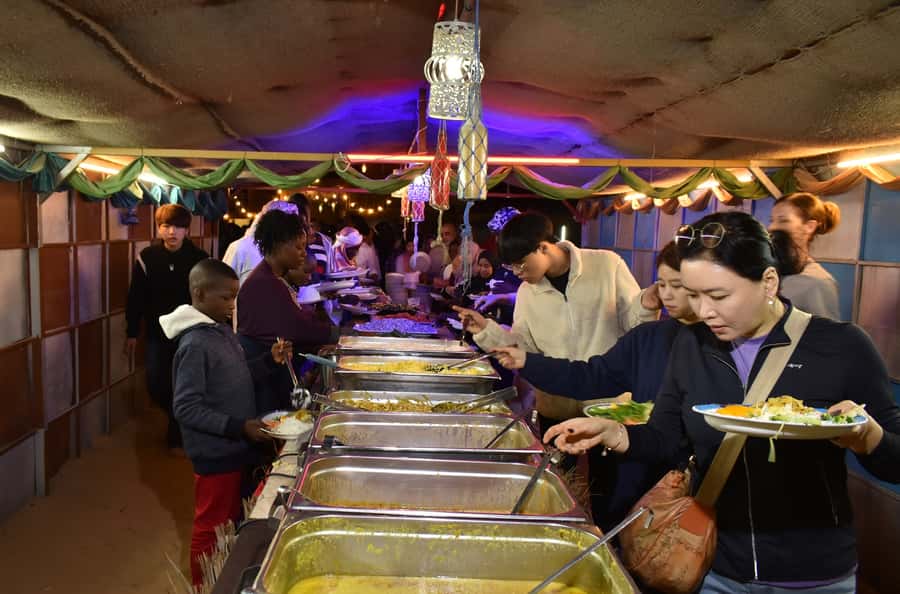 Dubai: Desert Safari, Camel Ride, and BBQ Dinner - Henna, Arabic coffee, and desert customs
