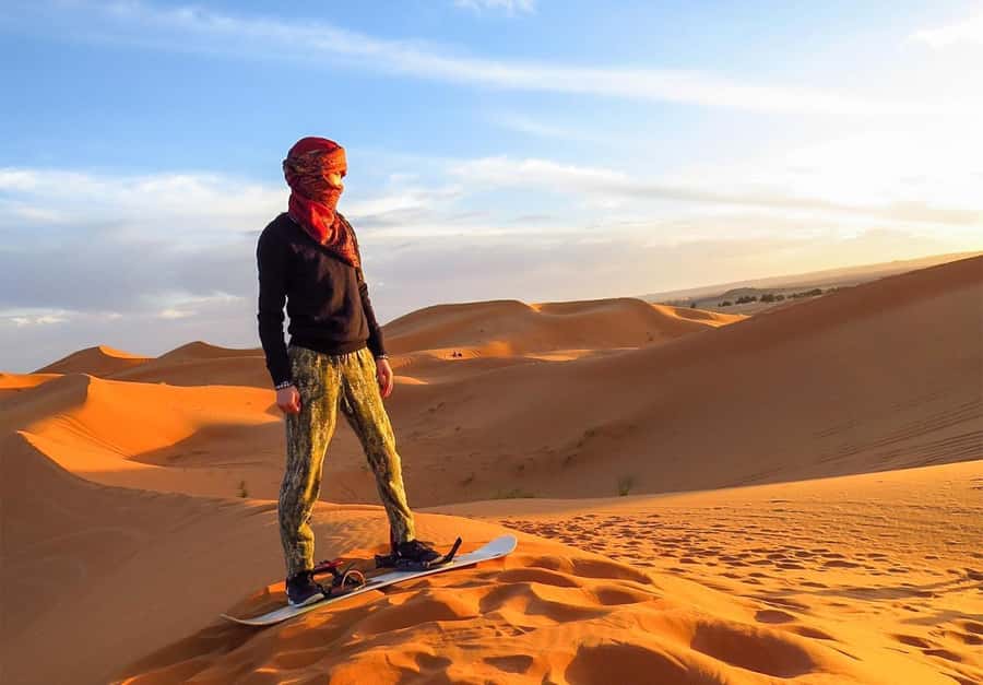 Dubai: Desert Safari, Camel Ride, Sandboard & Buffet Dinner - Hotel Pickup Begins the Seven-Hour Day