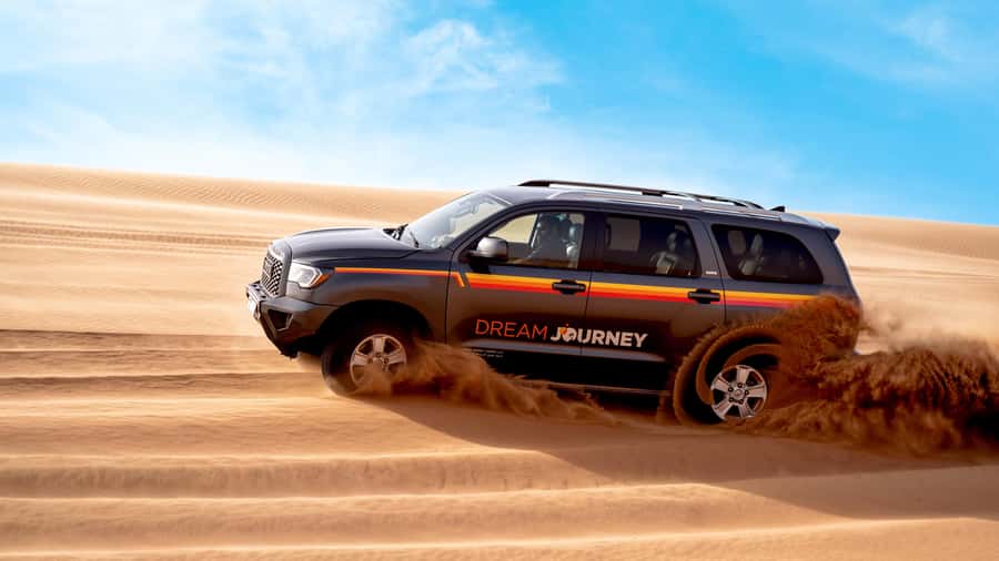 Dubai Desert Safari - Camel Ride, Sandboarding & 30 Min Quad - Leaving Dubai for the Lahbab red dunes