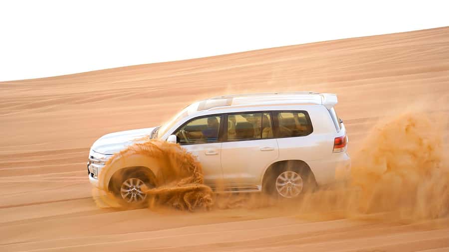 Dubai: Desert Safari, Camel Ride, Sandboarding, Quad Bike - The optional camp, BBQ, and evening show