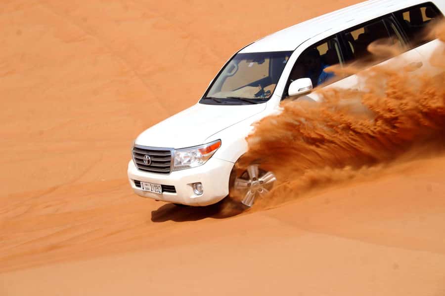 Dubai: Desert Safari, Camel Ride, Sandboarding, Quad Bike - The guides are part of the value