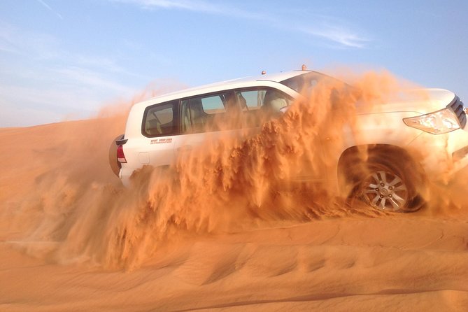 Dubai: Desert Safari, Camel Ride, Show & Optional Dinner - A ten-minute stop above the sand