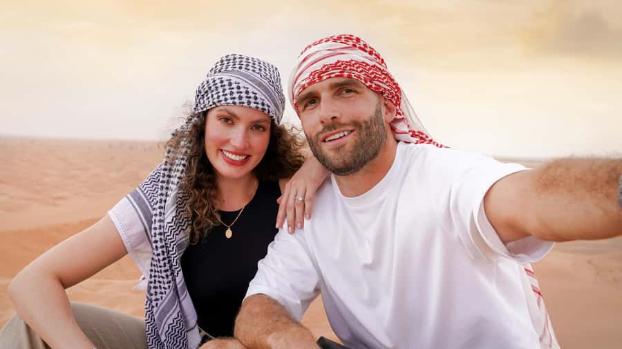 Dubai Desert Safari - Premium BBQ Dinner, Camel Ride & Shows - What the guide can add to the day