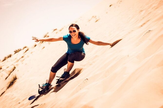 Dubai Desert Safari: Quad Bike, Camel Ride and BBQ Dinner - Sandboarding and the risk of missed activities