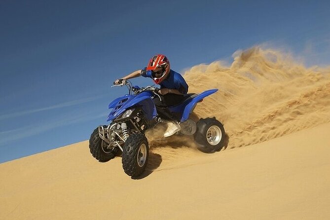 Dubai Desert Safari: Quad Bike, Camel Ride and BBQ Dinner - The Bedouin-style camp after sunset