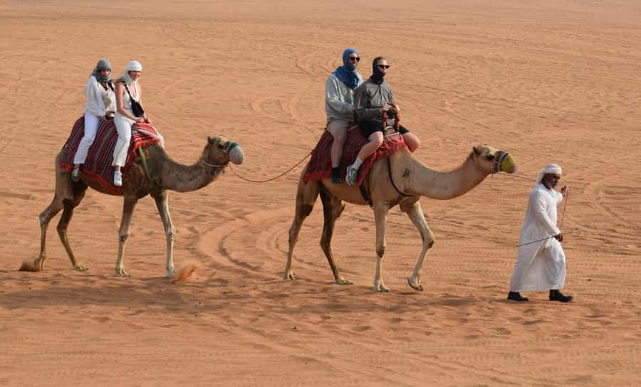 Dubai: Desert Safari, Quad Bike, Camel Ride and Sandboarding - Quad biking across the open desert