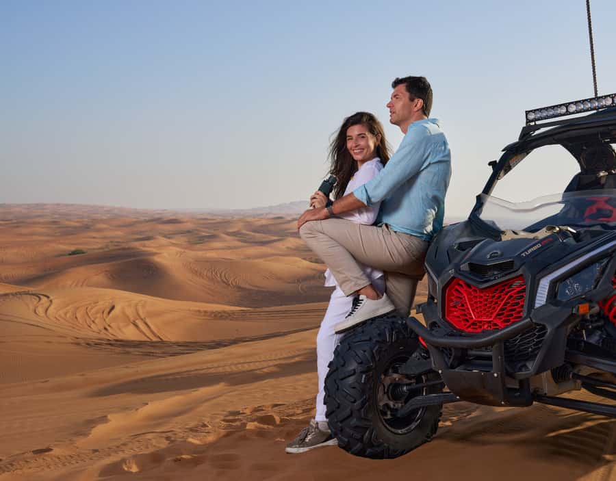 Dubai: Desert Safari, Quad Bike & Premium Camp Experience - From your Dubai hotel to the red dunes