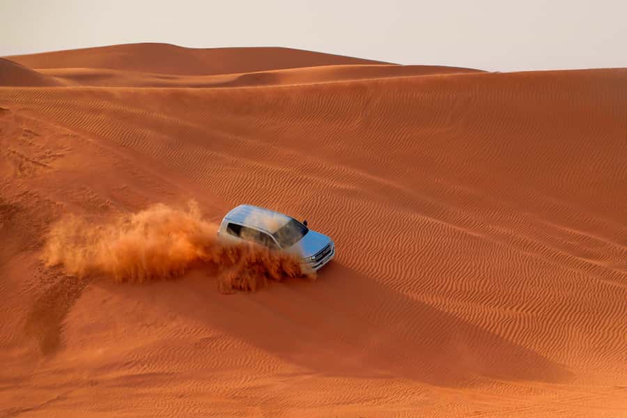 Dubai: Desert Safari, Quad Bike, Sandboarding, Camels & BBQ - The tire-pressure stop and optional quad biking