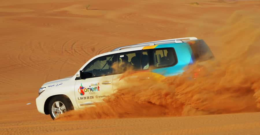 Dubai Desert Safari, Quad Biking, Camel Ride, & Sandboarding - A six-hour route from Dubai to Lahbab