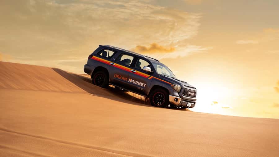 Dubai Desert Safari - Sandboarding, Quad Bike & BBQ Options - What dune bashing in Lahbab feels like