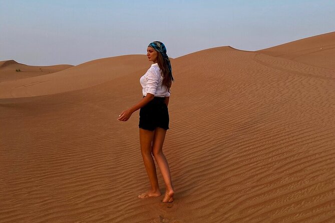 Dubai Desert Safari: Tanoura Show, Dune Bashing and BBQ Dinner - From Dubai streets to open desert