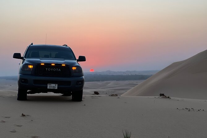 Dubai desert safari with 4x4 Dune Bashing,Camel Ride sand board - Sandboarding adds a simple burst of fun