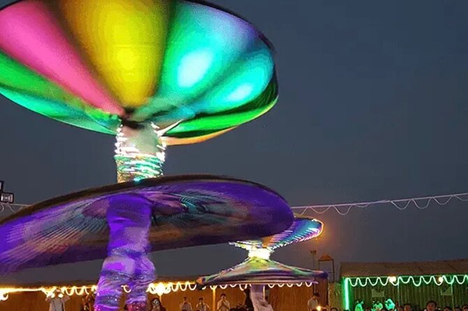 Dubai desert safari with 4x4 Dune Bashing,Camel Ride sand board - Dinner, refreshments, and the evening shows