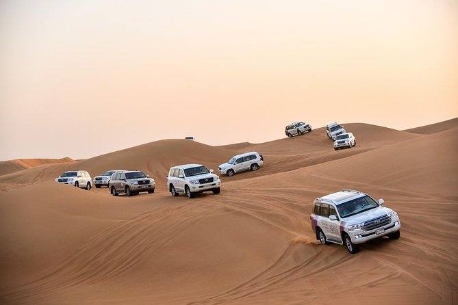 Dubai Desert Safari with BBQ And 4W Land Cruiser Dune Bashing Experience - The Land Cruiser ride across the sand