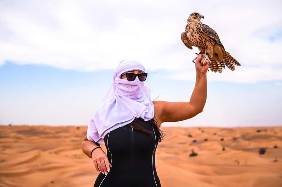 Dubai: Desert Safari with BBQ Dinner & Quad Biking Options - Sandboarding, photographs, and a short camel ride