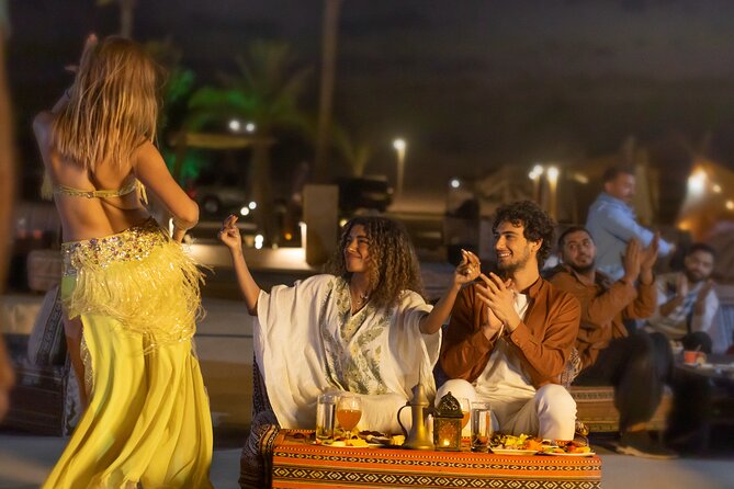 Dubai Desert Safari with Desert Camp Dinner, Camel Ride & Shows - Belly dancing, Tanura, and fire under the stars