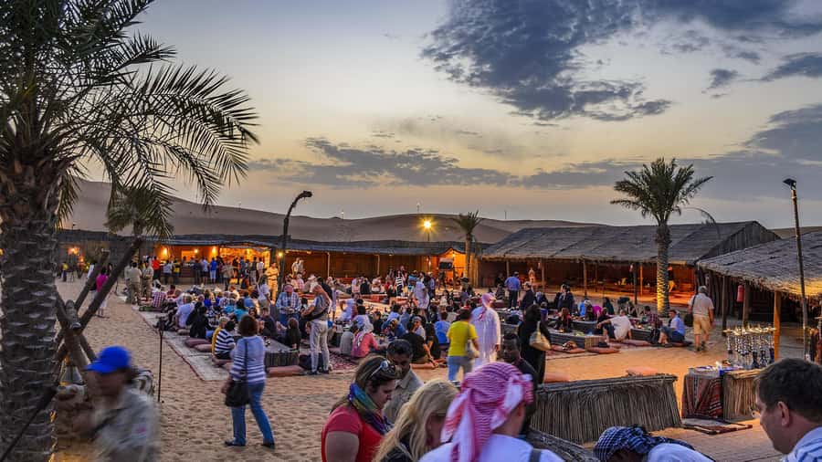 Dubai Desert Trail: Guided Quad/Polaris and Red Dunes Safari - Sandboarding from the highest dune