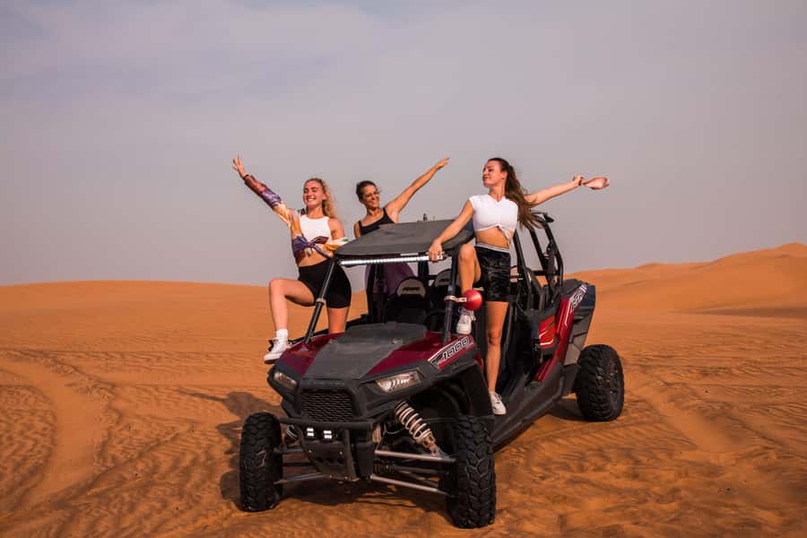 Dubai: Dune Buggy Desert Safari, Camel Ride & Sandboarding - Driving through the red dunes
