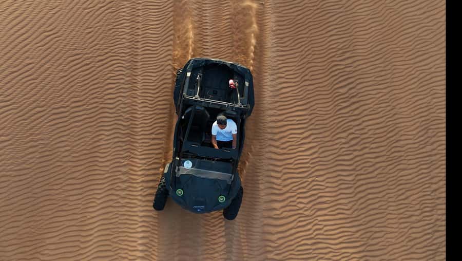 Dubai: Dune Buggy Safari and Camel Ride with Transportation - A short camel ride with John