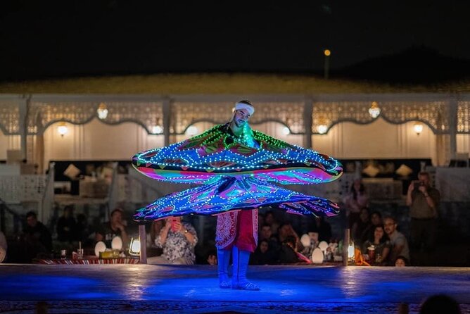 Dubai Dunes Safari With Quad Bike, Camel Ride, BBQ Dinner & Live Shows - The Al Awir camp after sunset