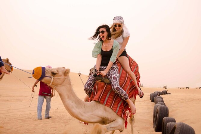 Dubai Evening 4x4 Desert Safari ATV Bike ,Camel Ride , BBQ Dinner - Sandboarding and the best photo stop