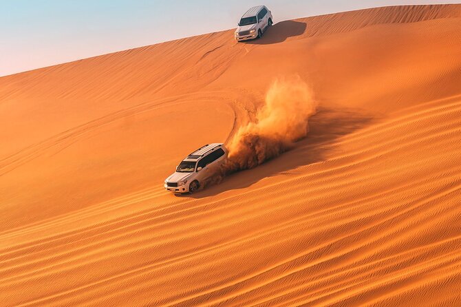 Dubai Evening 4x4 Desert Safari, Shows, Camel Ride BBQ Dinner - Dune bashing before sunset